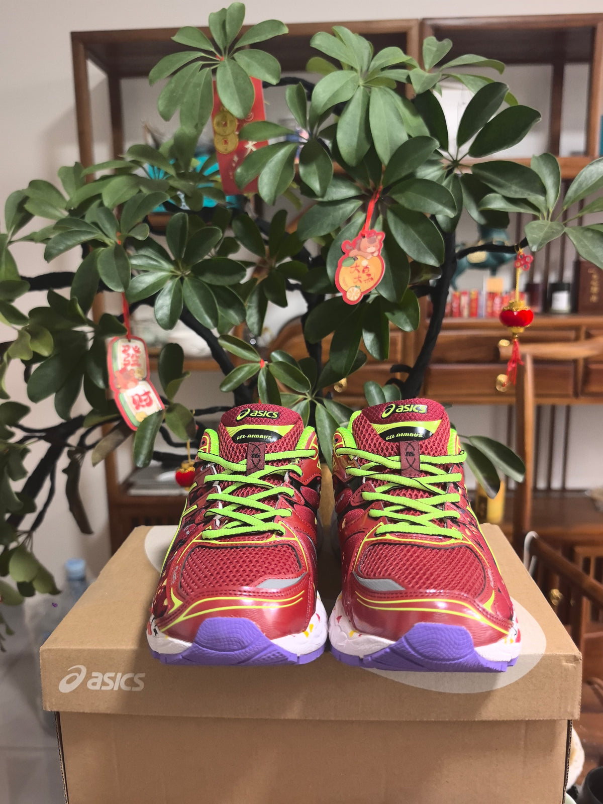 ASICS GEL-NIMBUS 16 Sneakers, in Burgundy and Lime - product image from the listing.