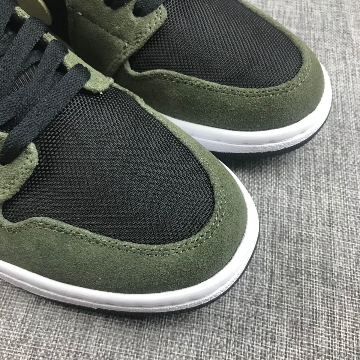 Air Jordan 1 Mid Sneakers in Olive Green BQ6472-030 - product image from the listing.