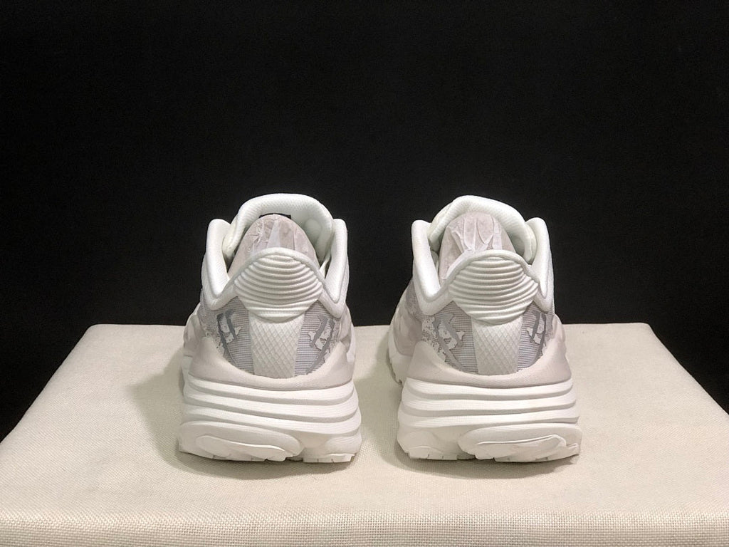 HOKA Stinson 7 Sneakers in White and Gray - product image from the listing.