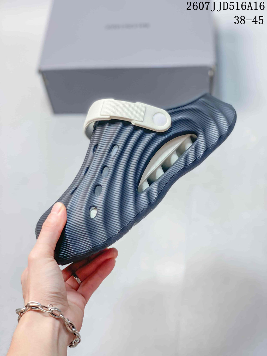 Navy and White Balenciaga Logo Slide Sandals 2607JJD516A16 - product image from the listing.