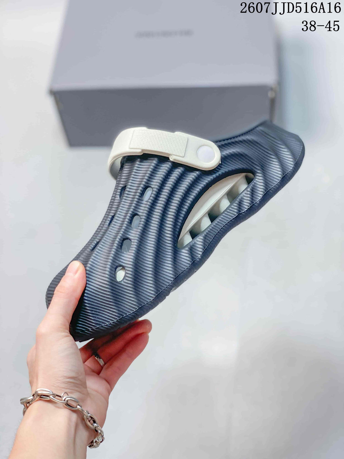 Navy and White Balenciaga Logo Slide Sandals 2607JJD516A16 - product image from the listing.