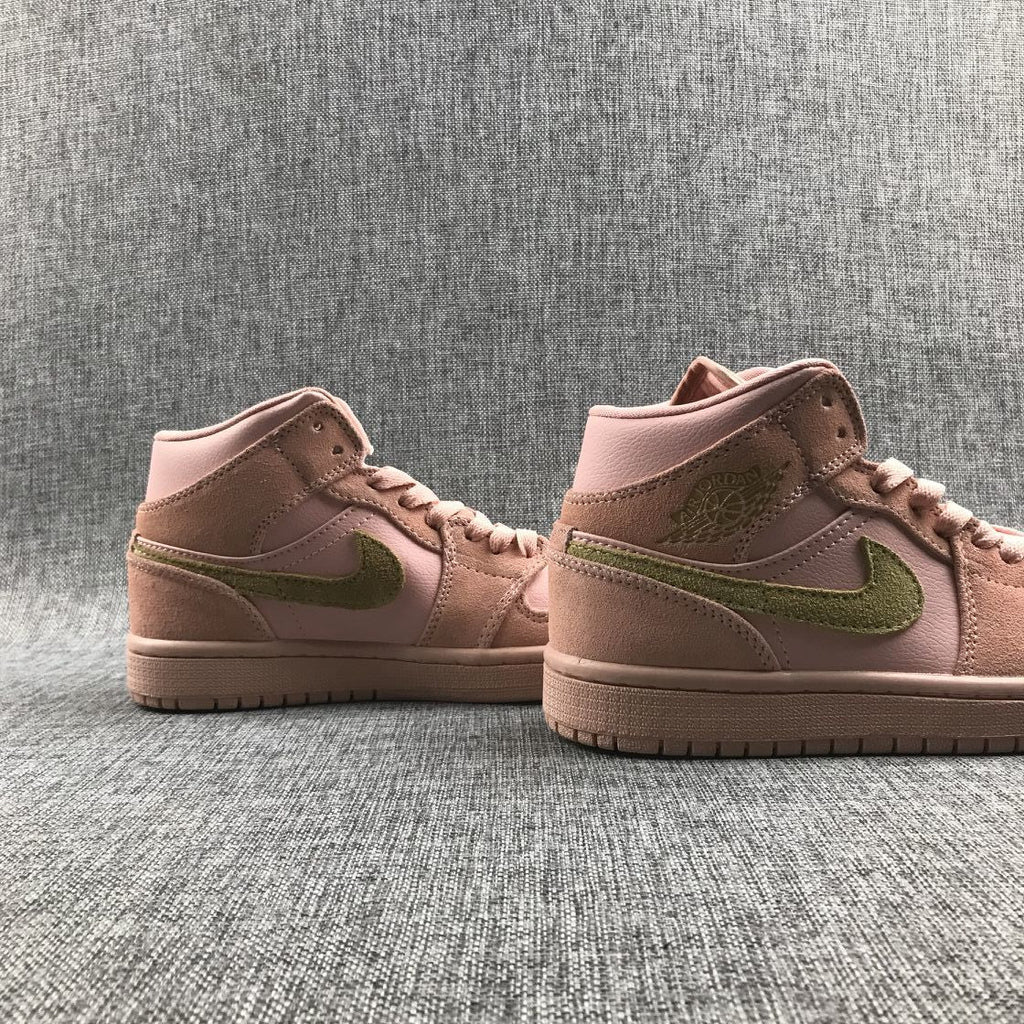 Jordan 1 Mid SE Sneakers in Pink 852542-600 - product image from the listing.