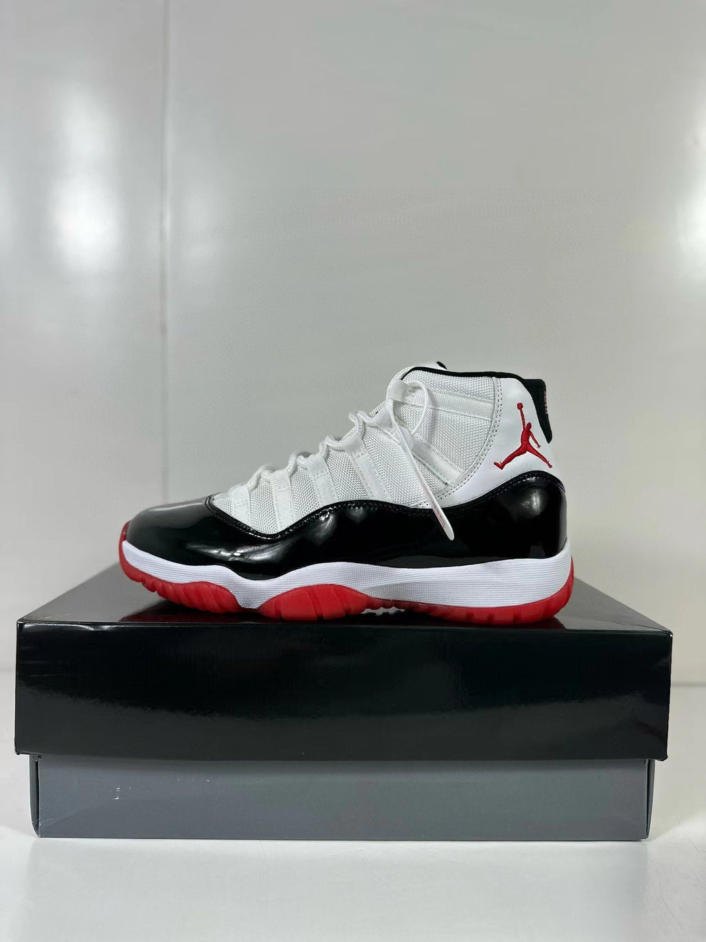 Air Jordan 11 Retro Concord Bred Sneakers CT8012-106 - product image from the listing.
