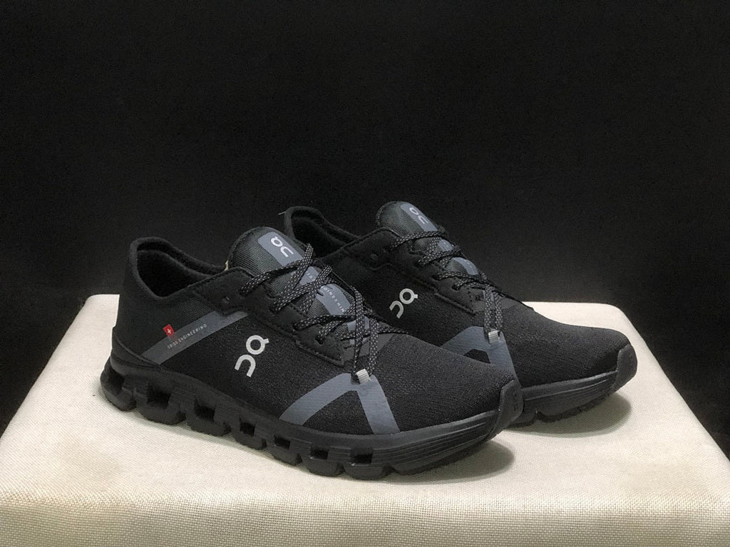 On Cloud X 4 AD Sneakers in Black - product image from the listing.