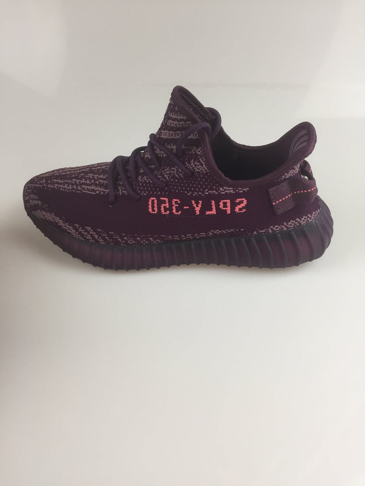 Black and Beige Yeezy 350 V2 Knit Sneakers - product image from the listing.