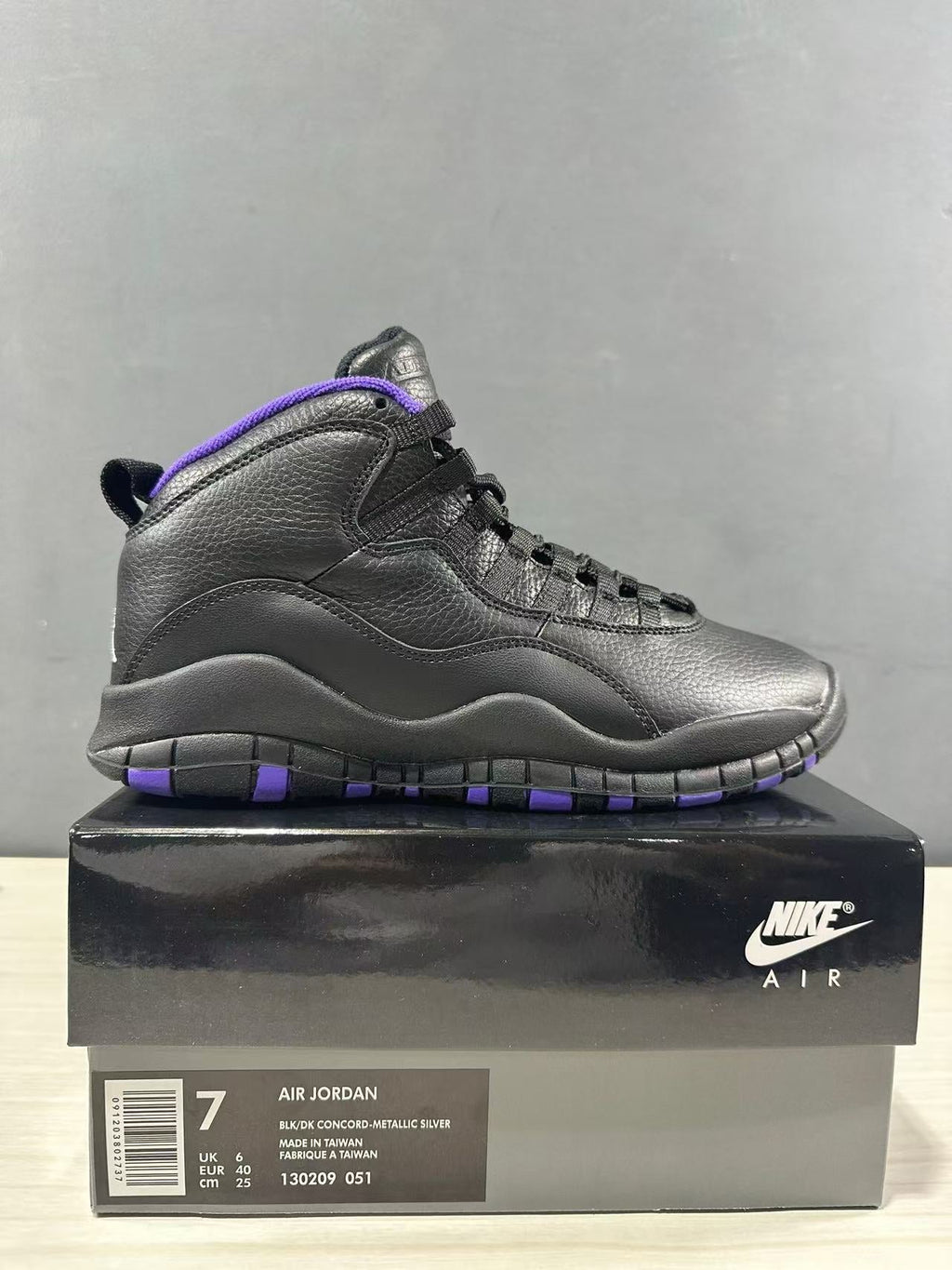 Air Jordan 10 High-Top Sneakers Black Purple 130209-051 - product image from the listing.
