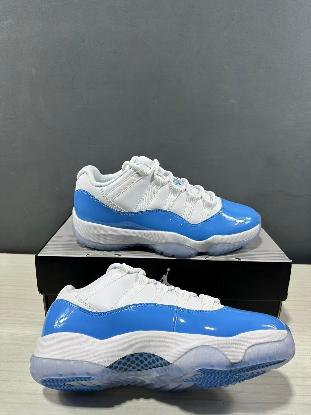 Air Jordan 11 Retro Low UNC Blue Sneakers FV5104-100 - product image from the listing.