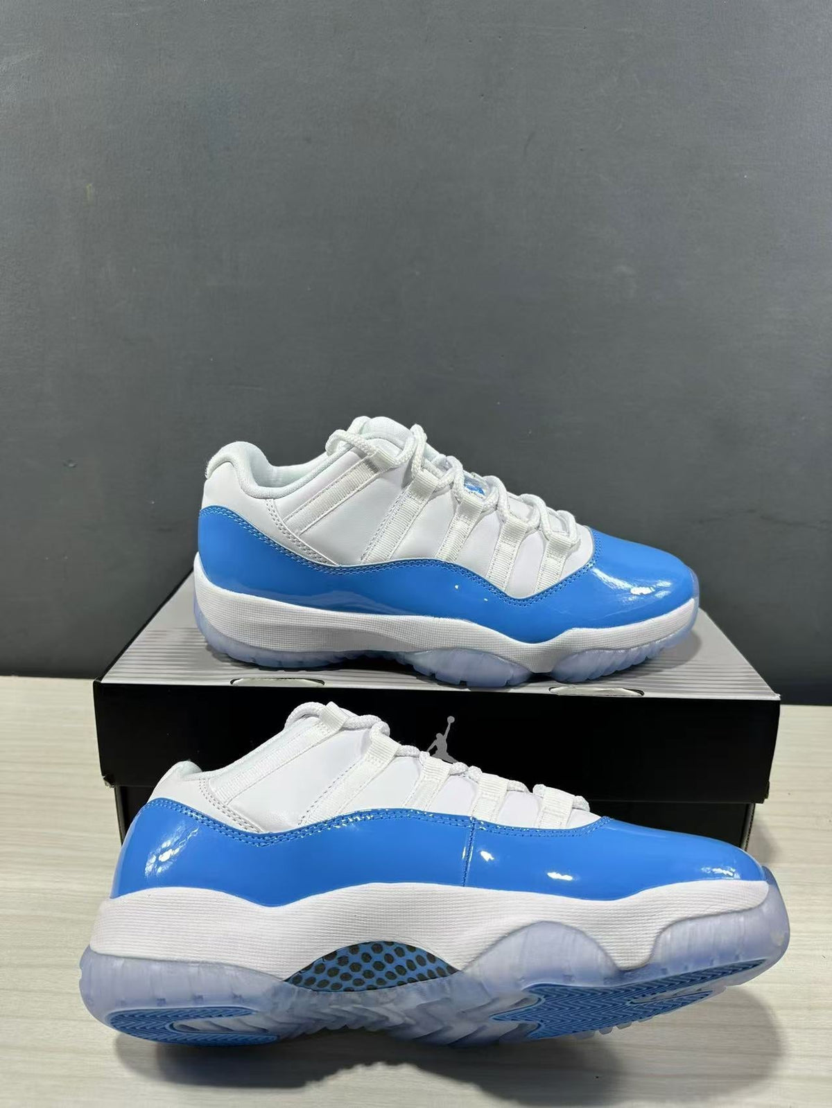 Air Jordan 11 Retro Low UNC Blue Sneakers FV5104-100 - product image from the listing.