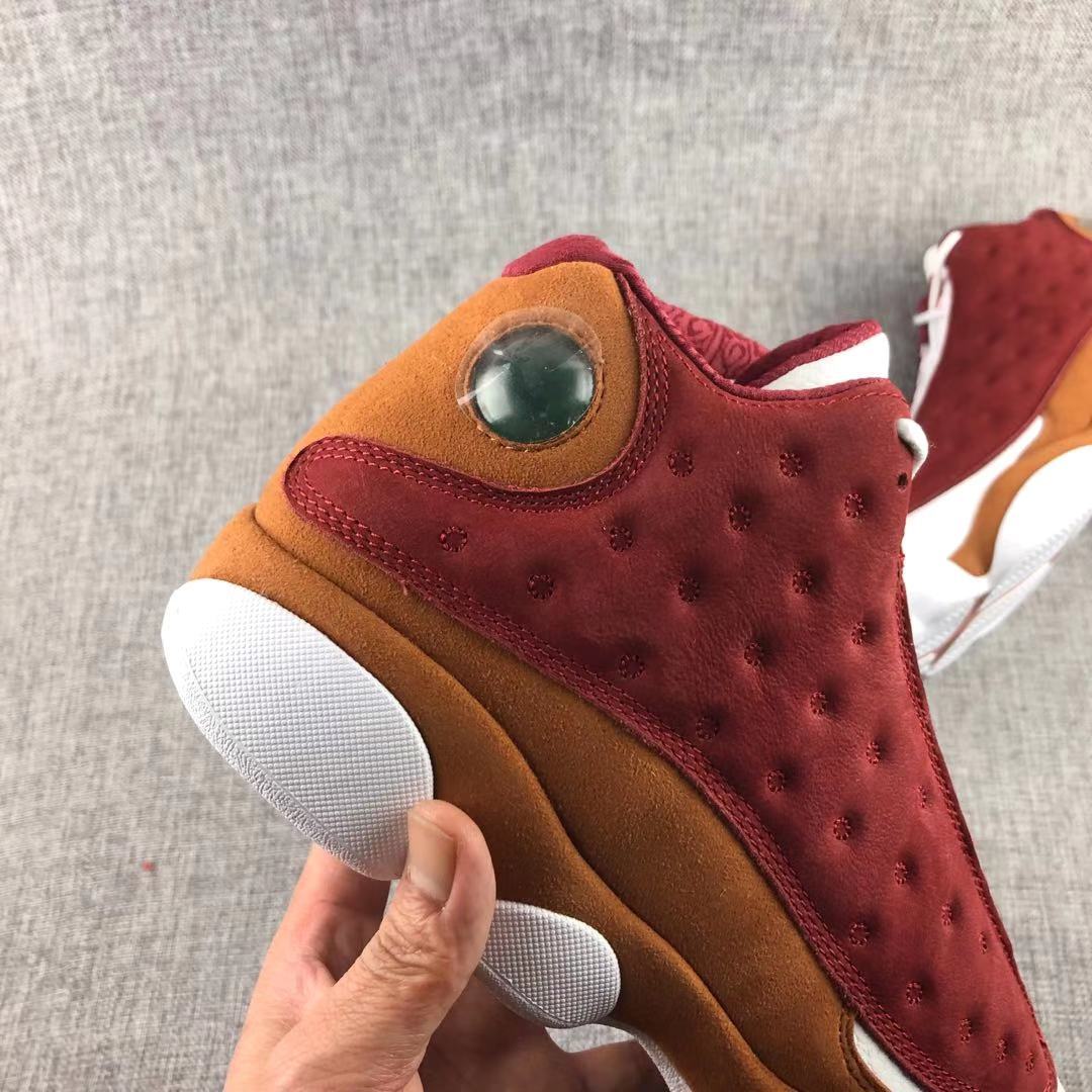 Air Jordan 13 Bin 23 Sneakers Burgundy Brown 417212-601 - product image from the listing.