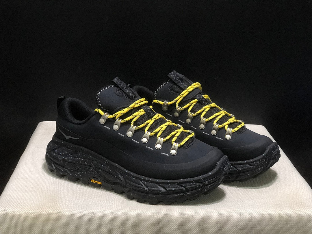 HOKA Tor Summit Trail Sneakers in Black and Yellow - product image from the listing.