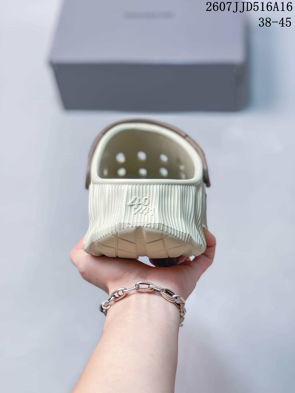 Balenciaga Molded Clog Slides in Cream Brown 2607JJD516A16 - product image from the listing.