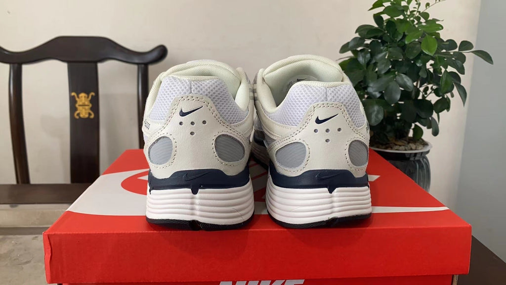Nike P-6000 Sneakers in White Navy CD6404-108 - product image from the listing.
