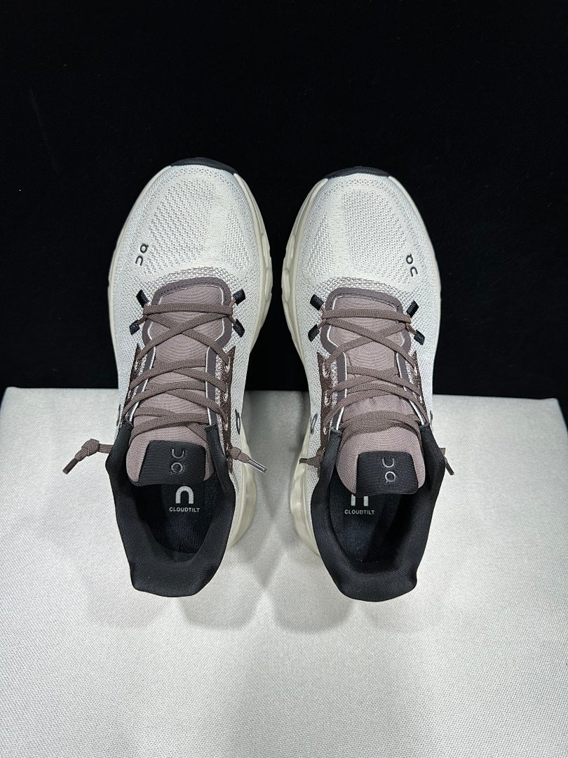 On Cloudtilt Sneakers, in Light Gray and Black - product image from the listing.