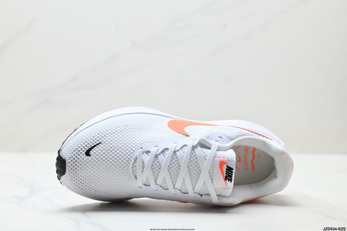 Nike Revolution 8 Running Shoes in White and Orange - product image from the listing.