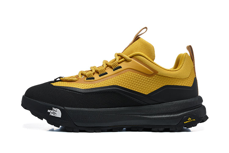 The North Face Yellow and Black Low-Cut Trail Sneakers - product image from the listing.