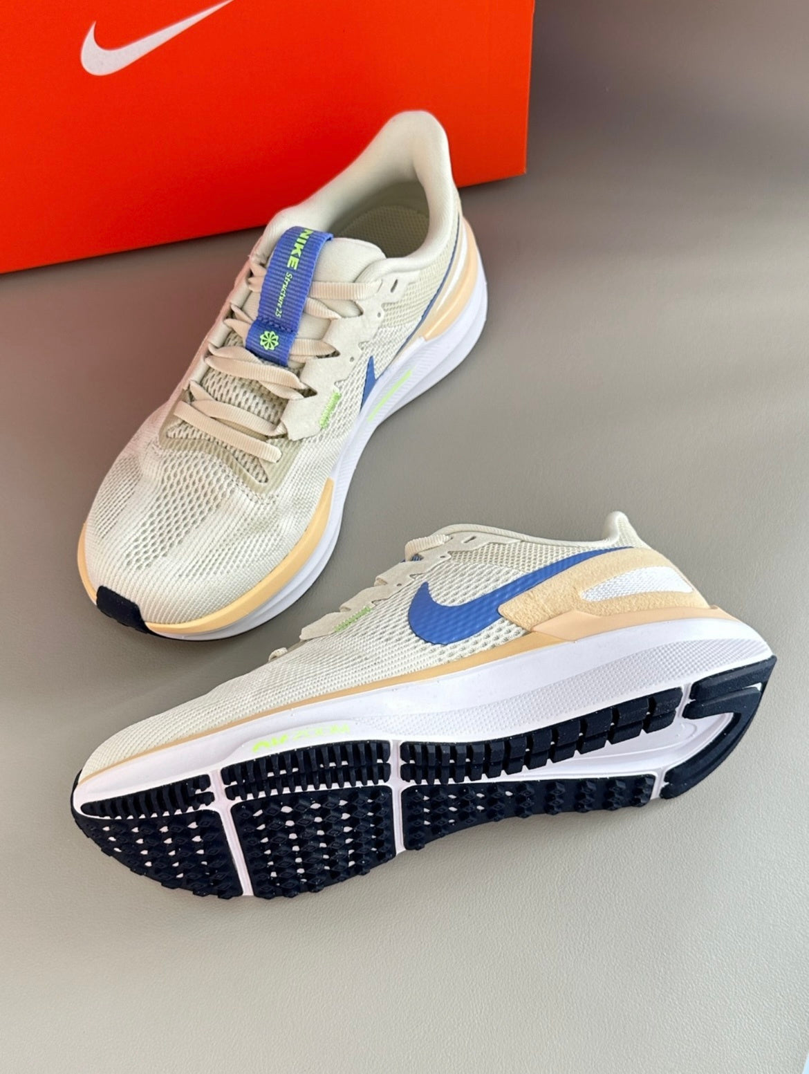 Nike Structure 25 Road Running Shoes DJ7884-004 in Beige - product image from the listing.