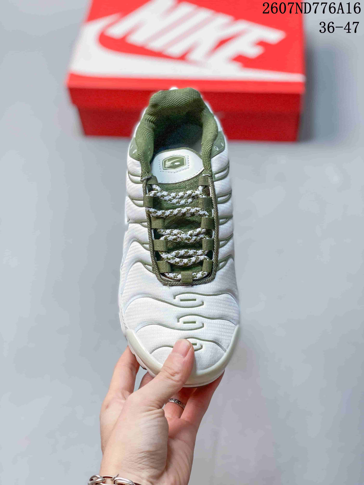 Nike Air Max Plus Sneakers in White and Green 2607ND776A16 - product image from the listing.