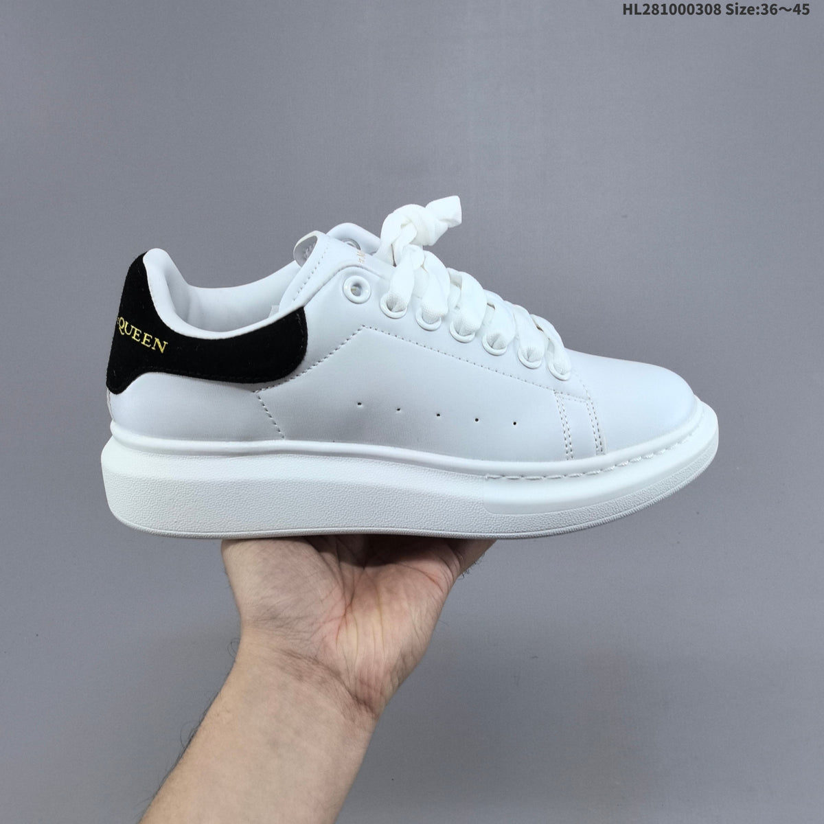 Alexander McQueen Oversized Low-Top Sneakers, in White and Black HL281000308 - product image from the listing.