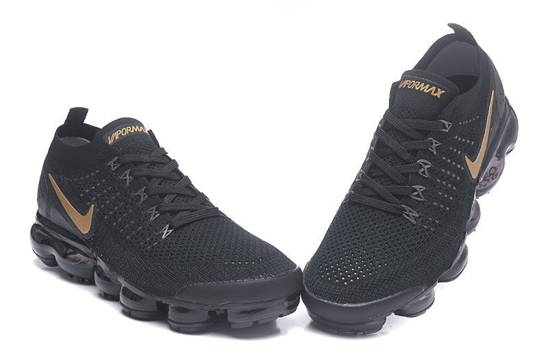 Nike Air VaporMax Flyknit 2 Sneakers in Black Gold 942842-203 - product image from the listing.