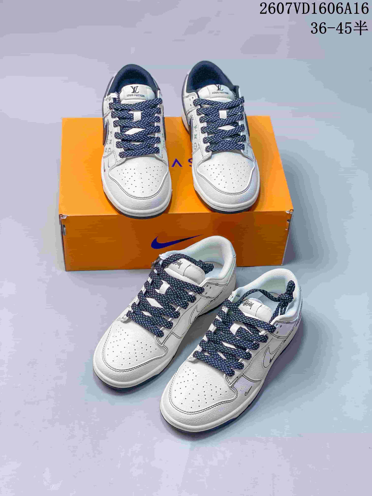 Nike SB Dunk Low White Gray Monogram-Style Trainers - product image from the listing.