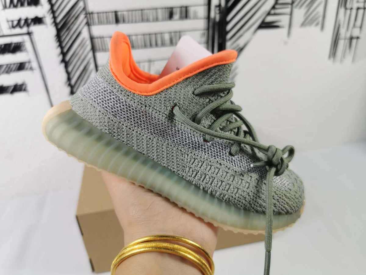 Grey and Orange Yeezy 350 V2 Kids Sneakers - product image from the listing.