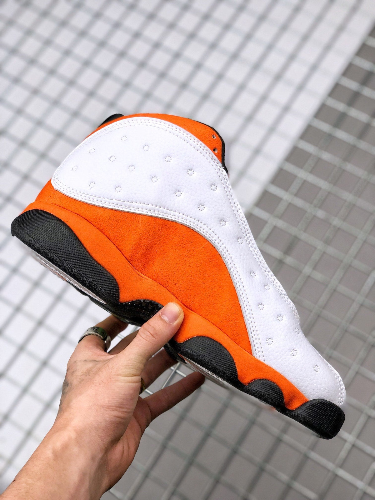 Air Jordan 13 Starfish White Orange Sneakers 414571-108 - product image from the listing.