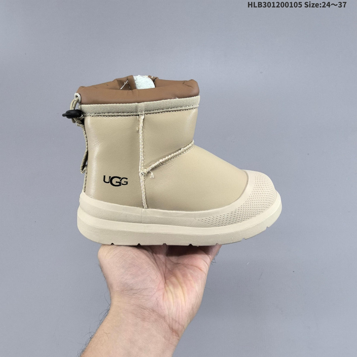 Kids Mini Ankle Snow Boots by UGG - product image from the listing.