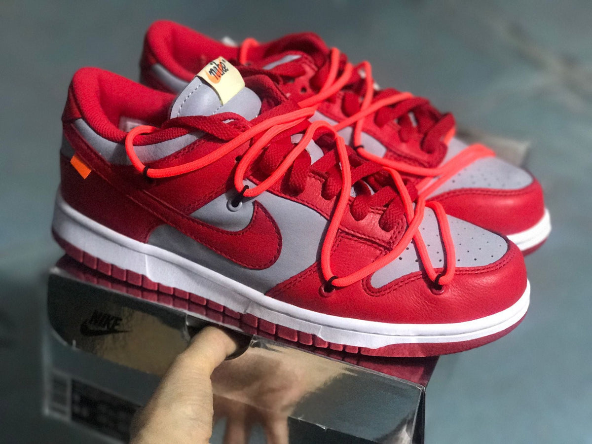 Nike Dunk Low LTHR / OW Sneakers in Red Gray CT0856-600 - product image from the listing.