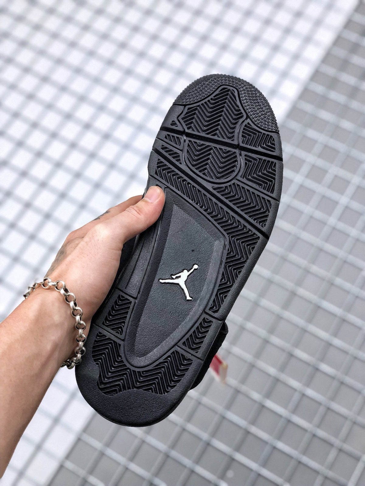 Air Jordan 4 Black Cat Sneakers CU1110-010 - product image from the listing.