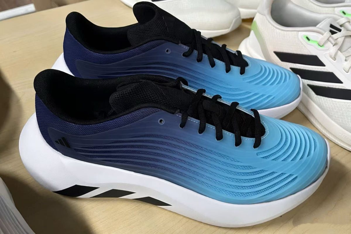 Adidas Supernova Rise Sneakers in Black Blue White - product image from the listing.