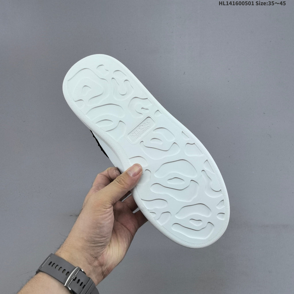 Alexander McQueen Oversized White Low-Cut Sneakers with Black Heel - product image from the listing.
