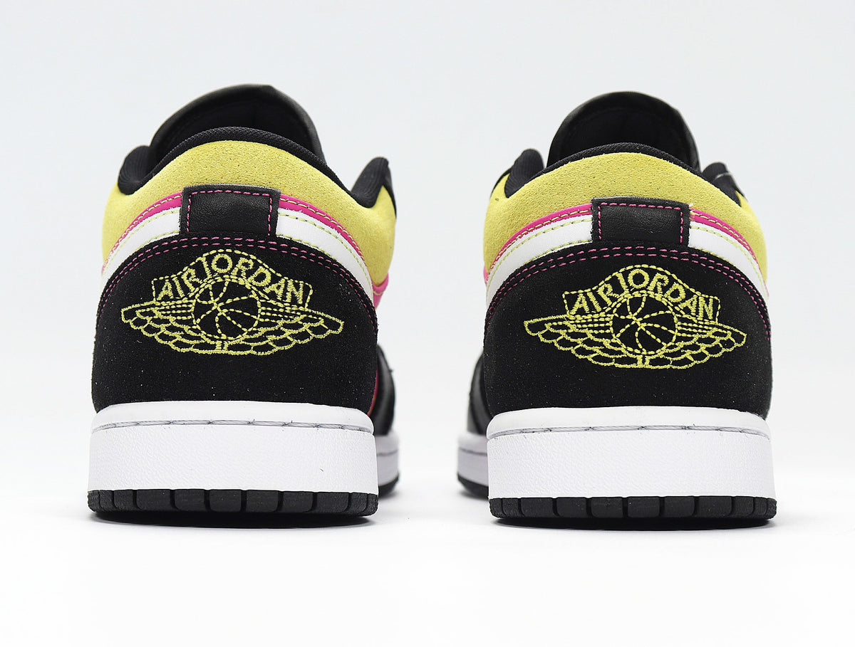Jordan 1 Low Sneakers in Yellow Pink Black CW5564-001 - product image from the listing.