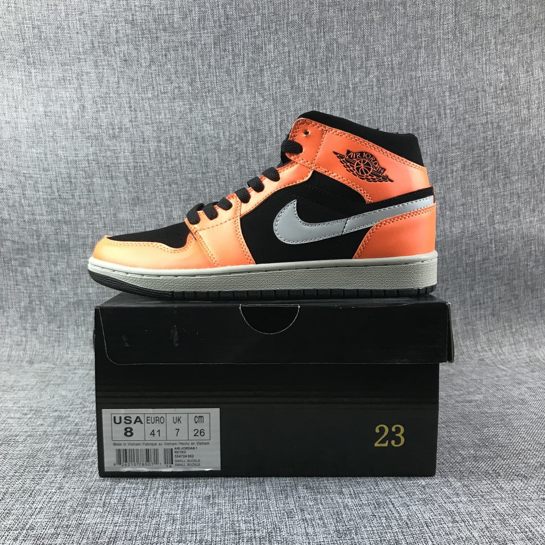 Air Jordan 1 Mid Sneakers in Black Orange 554724-062 - product image from the listing.