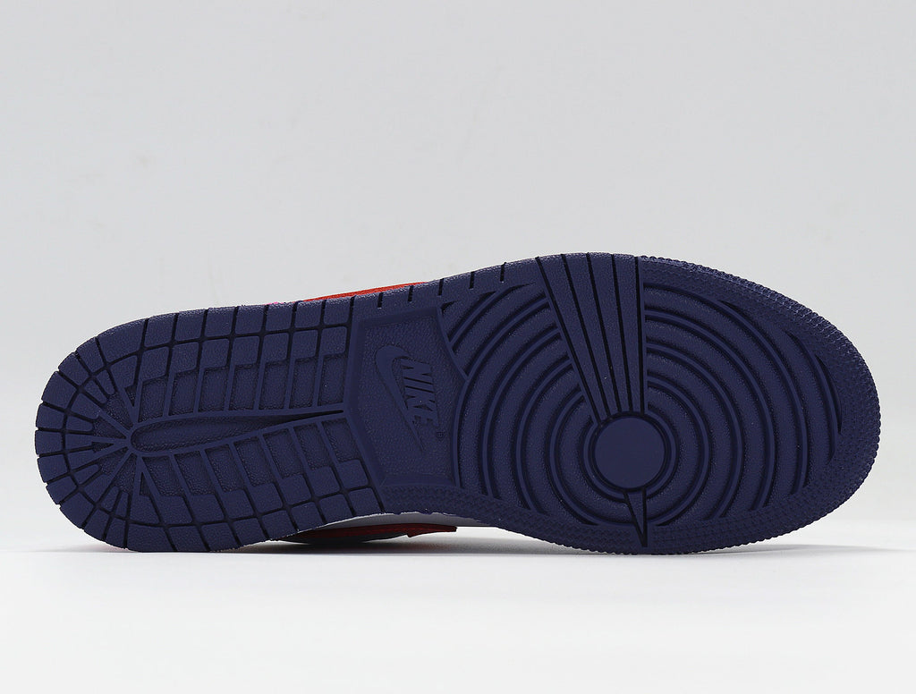 Jordan 1 Low SE Sneakers in Pink Gray Orange 554723-502 - product image from the listing.
