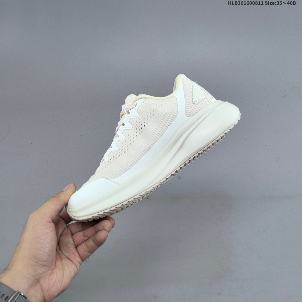 Ivory FILA Pebble Sandal Sneakers - product image from the listing.