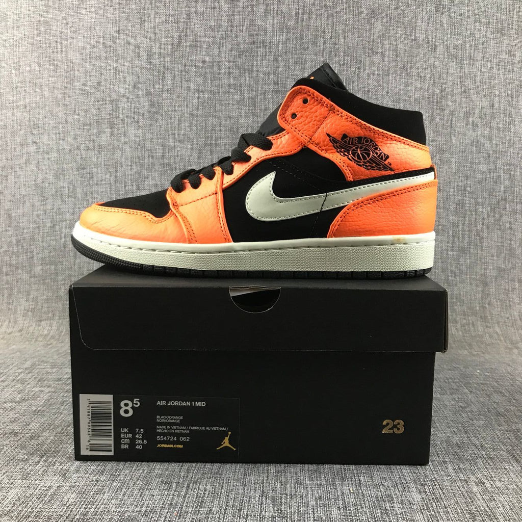 Air Jordan 1 Mid Shattered Backboard Sneakers, in Black and Orange - product image from the listing.