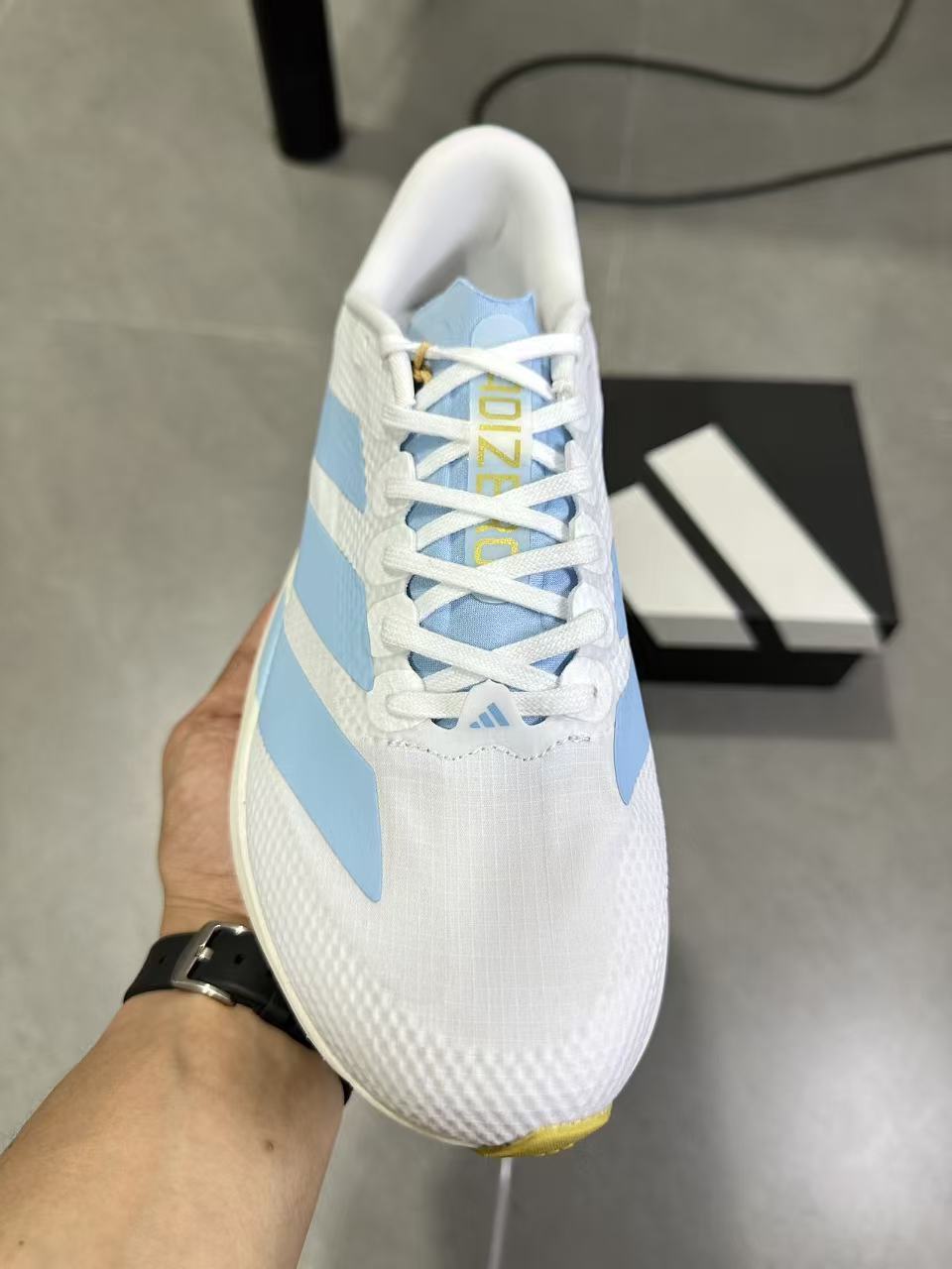 Adidas Lightstrike Pro Running Shoes in White Blue JQ4527 - product image from the listing.