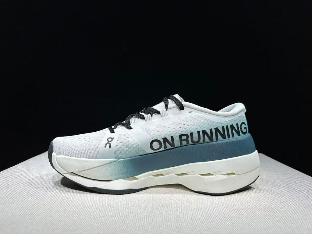 On Cloudboom Max Running Shoes in White and Lake in Blue - product image from the listing.