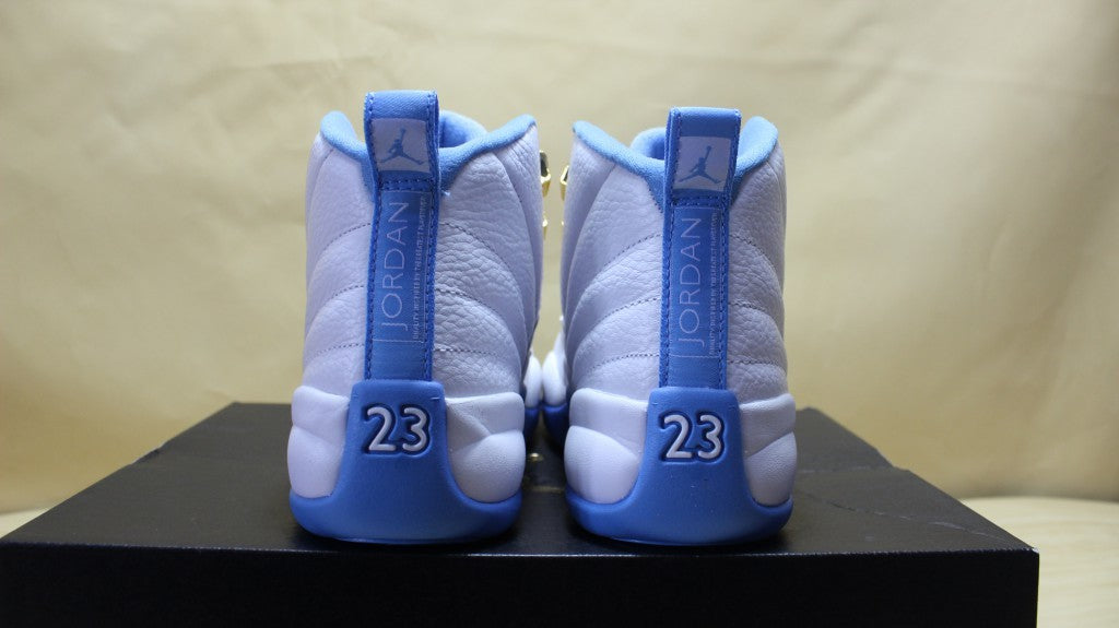 Air Jordan 12 High-Top Sneakers in University Blue 510815-127 - product image from the listing.