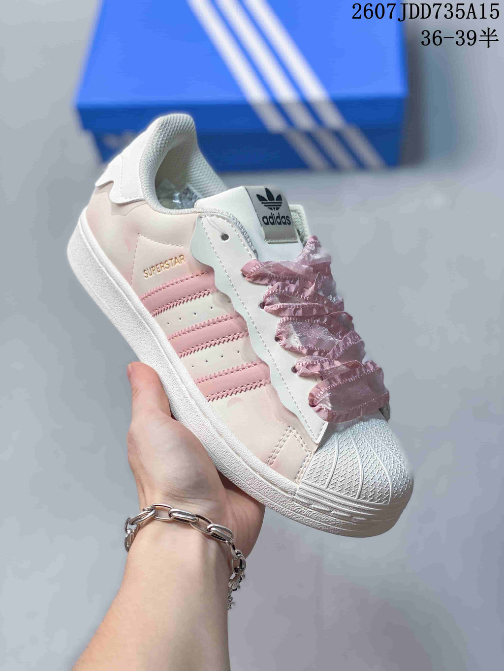 adidas Superstar Sneakers in White and Pink 2607JDD735A15 - product image from the listing.