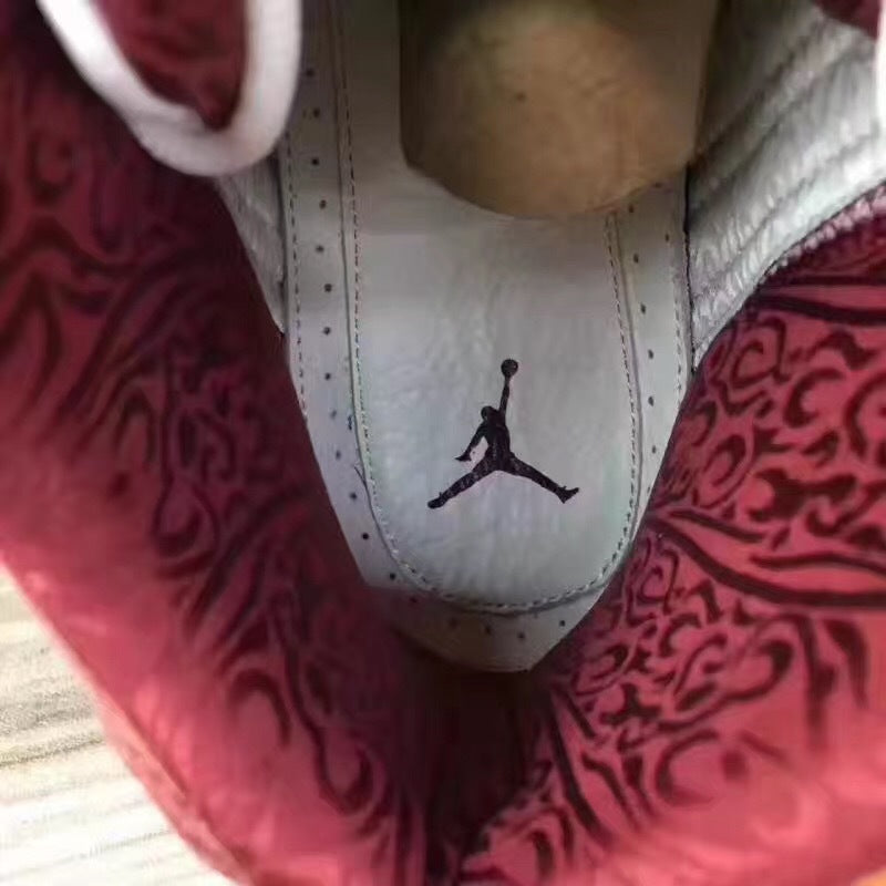 Jordan 13 Sneakers in Burgundy Brown White - product image from the listing.