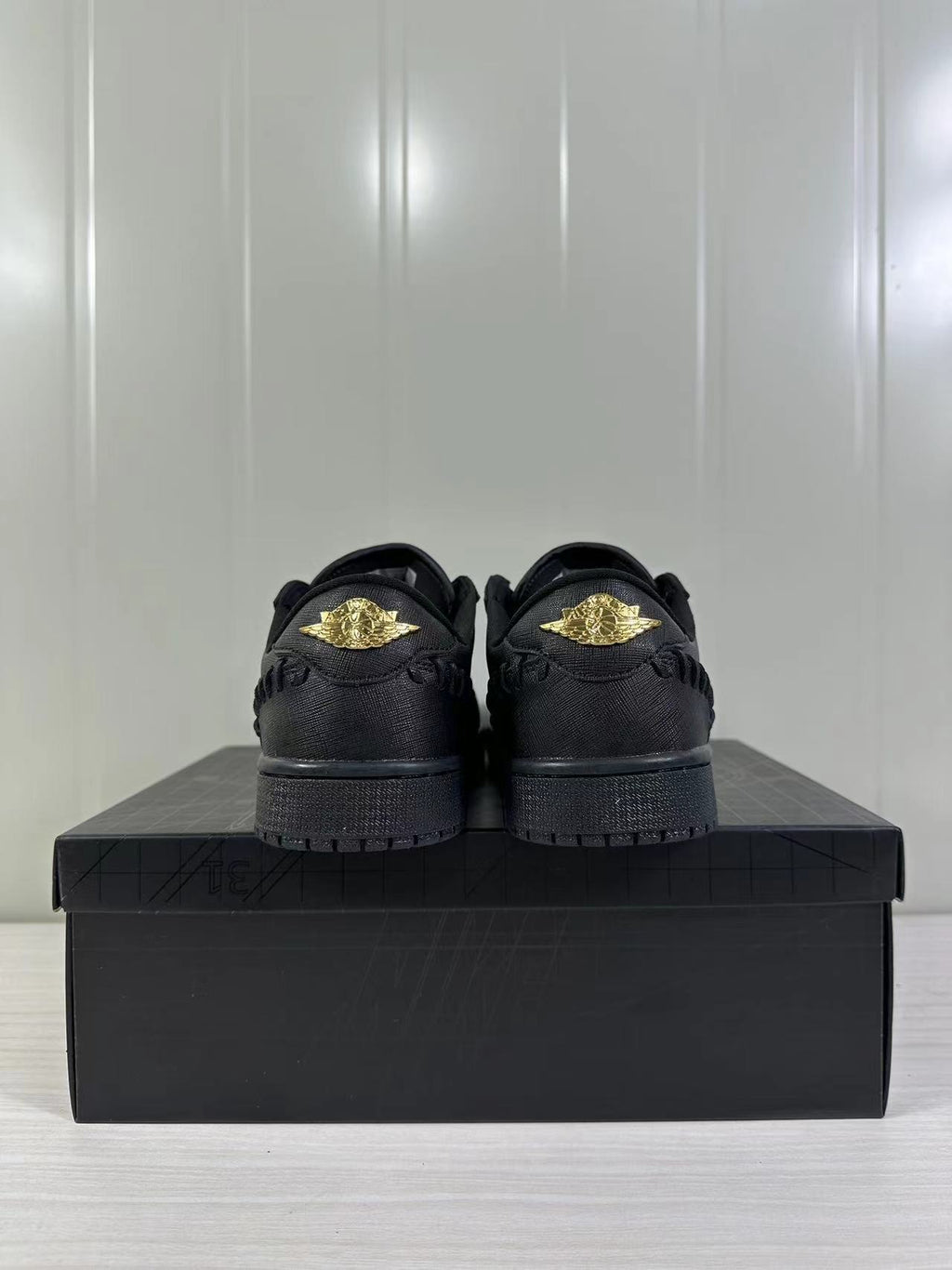 Air Jordan 1 Low Sneakers Black/Gold FN5032-007 - product image from the listing.