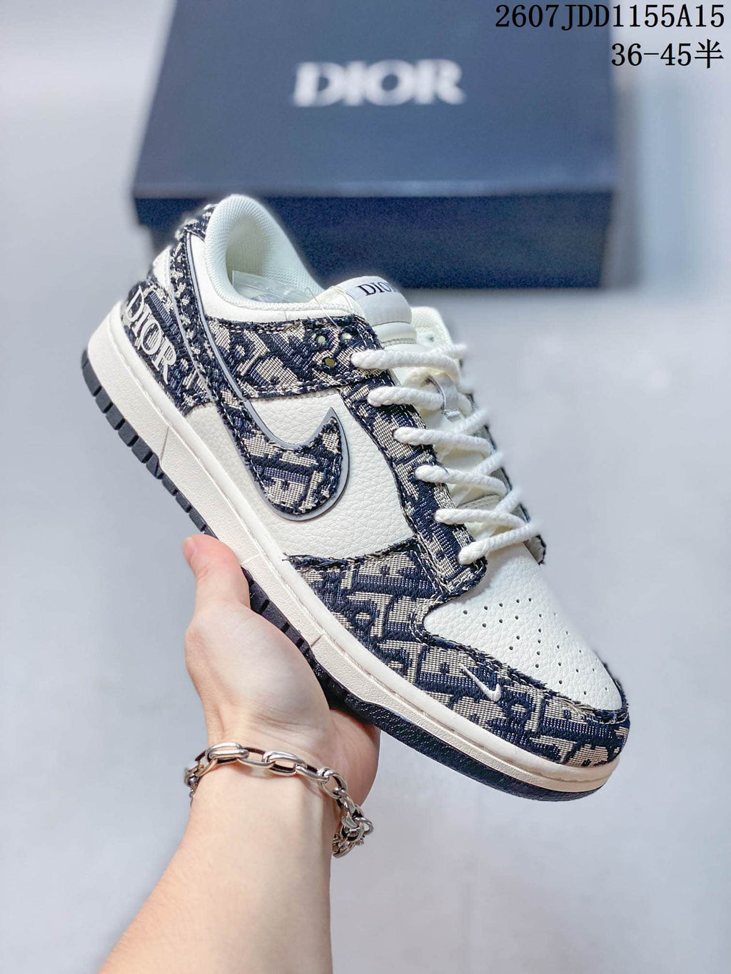 Nike SB Dunk Low White Navy Dior Pattern Trainers - product image from the listing.