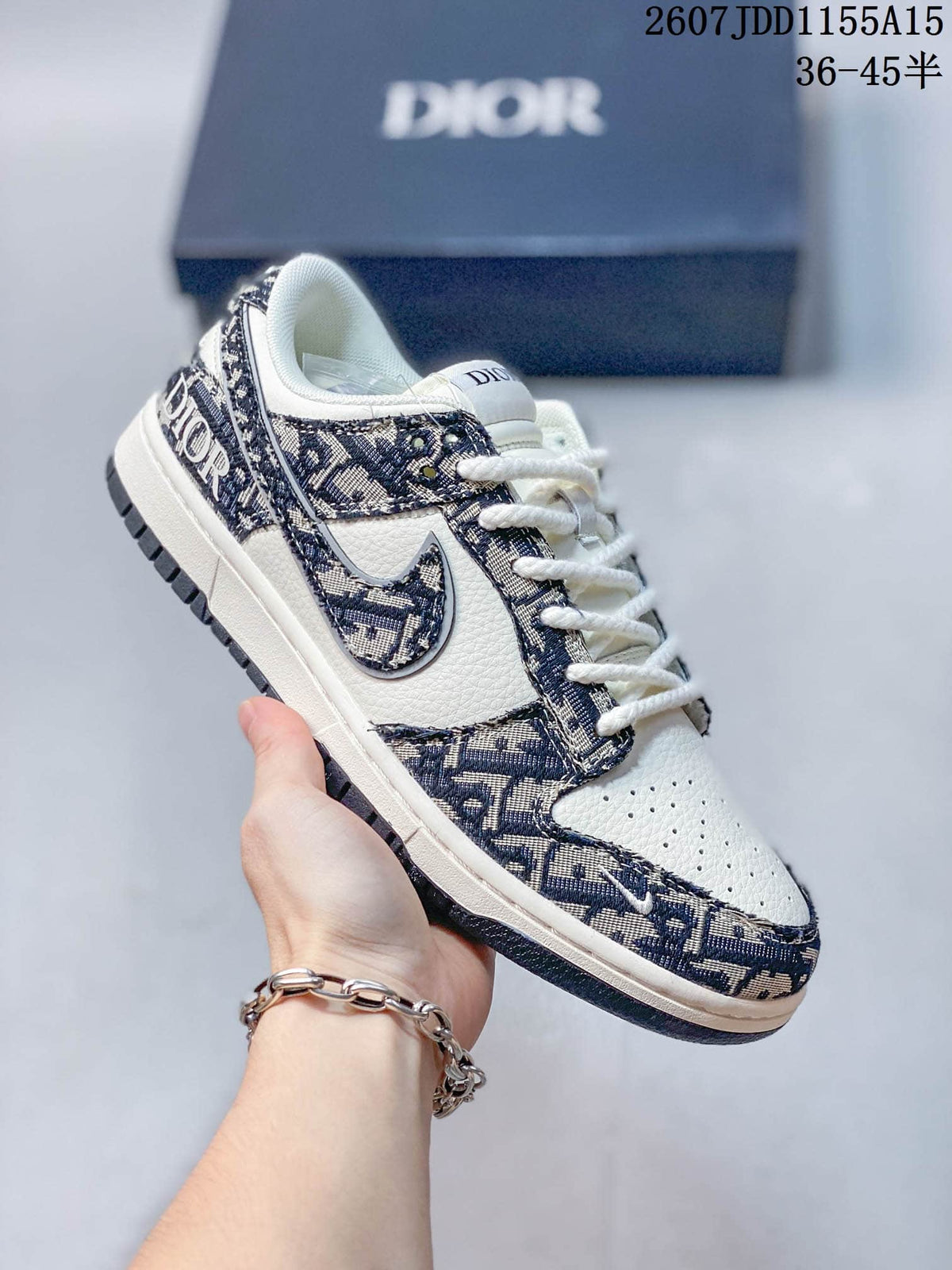 Nike SB Dunk Low White Navy Dior Pattern Trainers - product image from the listing.