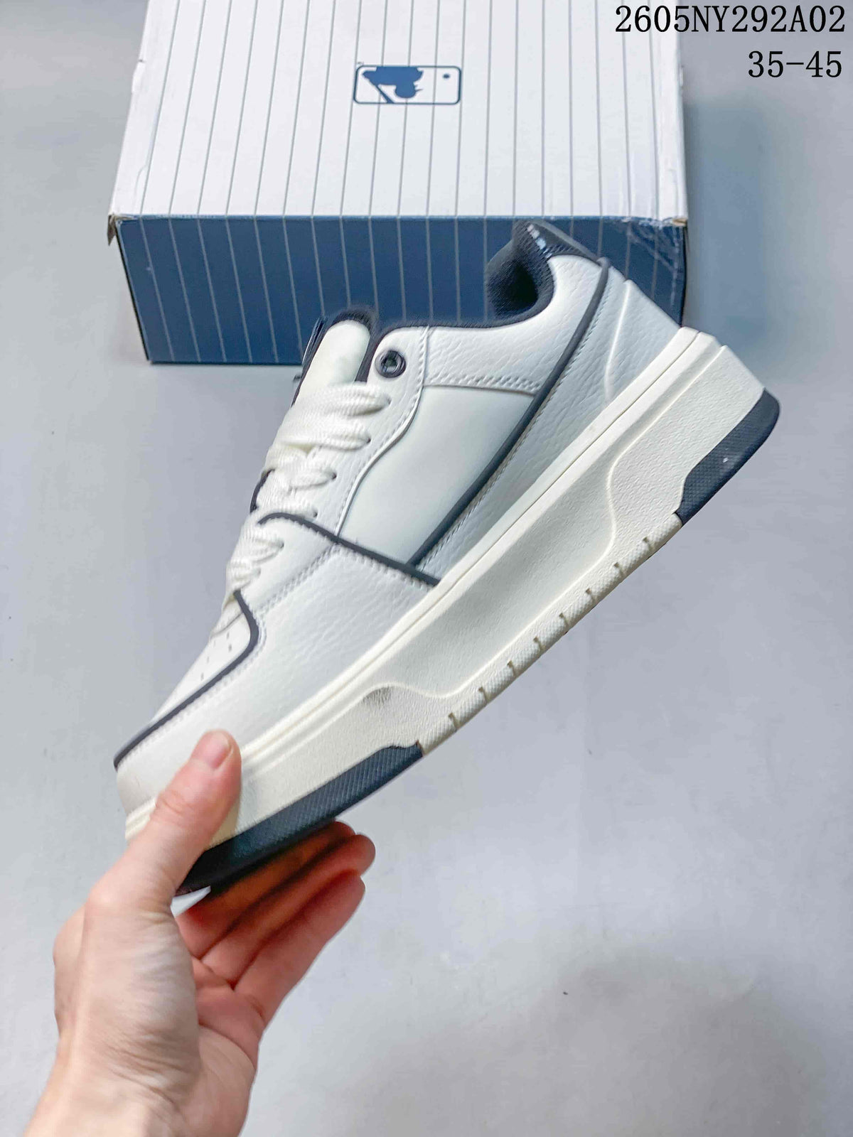 MLB Chunky Liner Low-Top Sneakers in White Navy - product image from the listing.