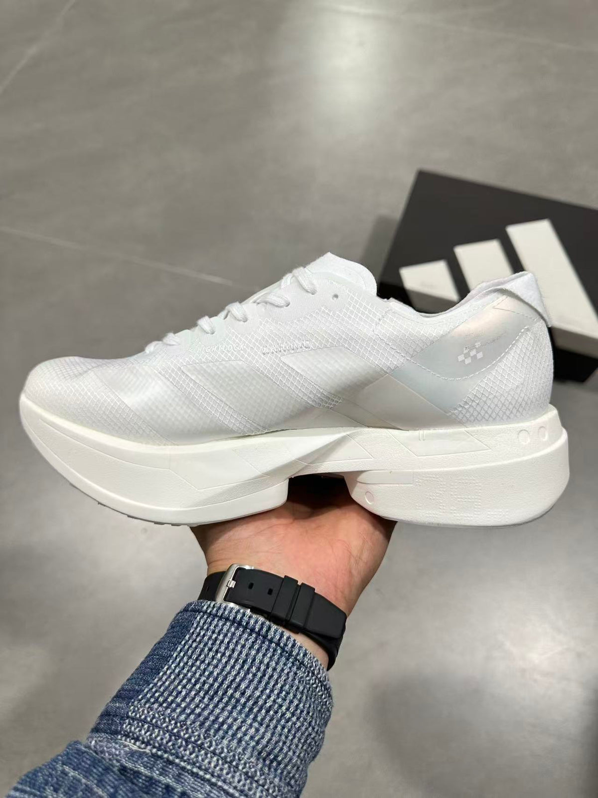 Adidas Adizero Lightstrike Pro Running Shoes in White JR6355 - product image from the listing.