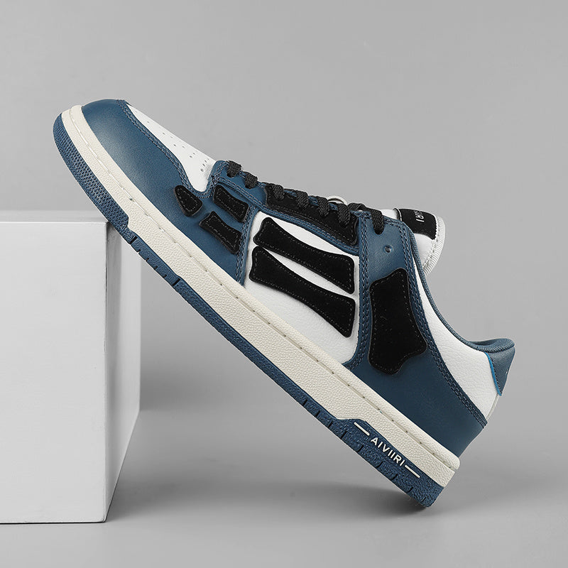 AMIRI Low-Top Sneakers in Navy, in White and Black - product image from the listing.
