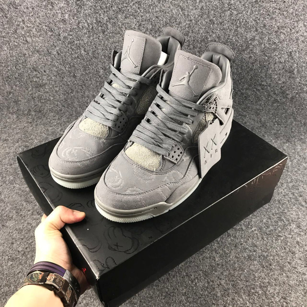 Grey Jordan 4 KAWS Sample High-Top Sneakers - product image from the listing.