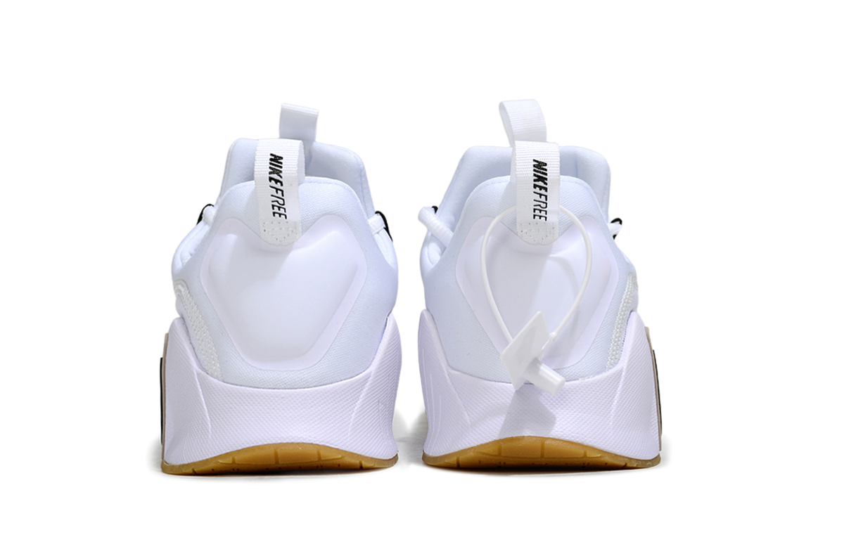 Nike Free White Trainers with Gum Outsole - product image from the listing.