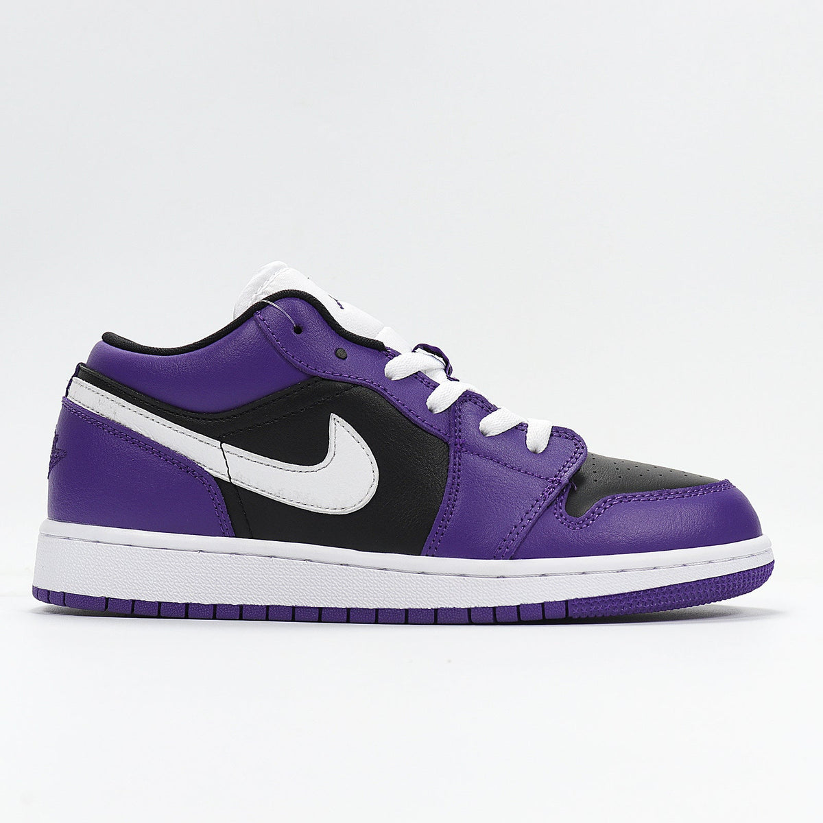 Jordan 1 Low Sneakers in Black Purple White 553560-501 - product image from the listing.